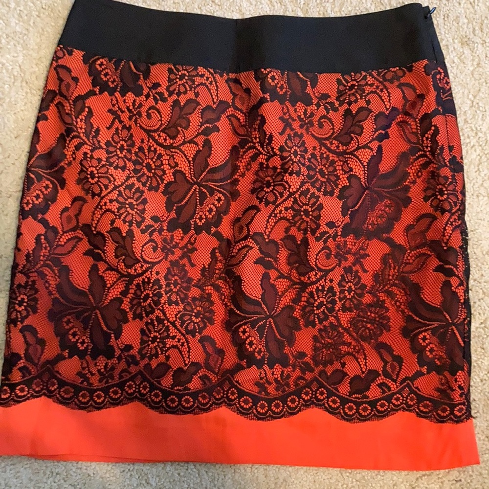 Limited orange and black size 6 skirt. 19’’ length.